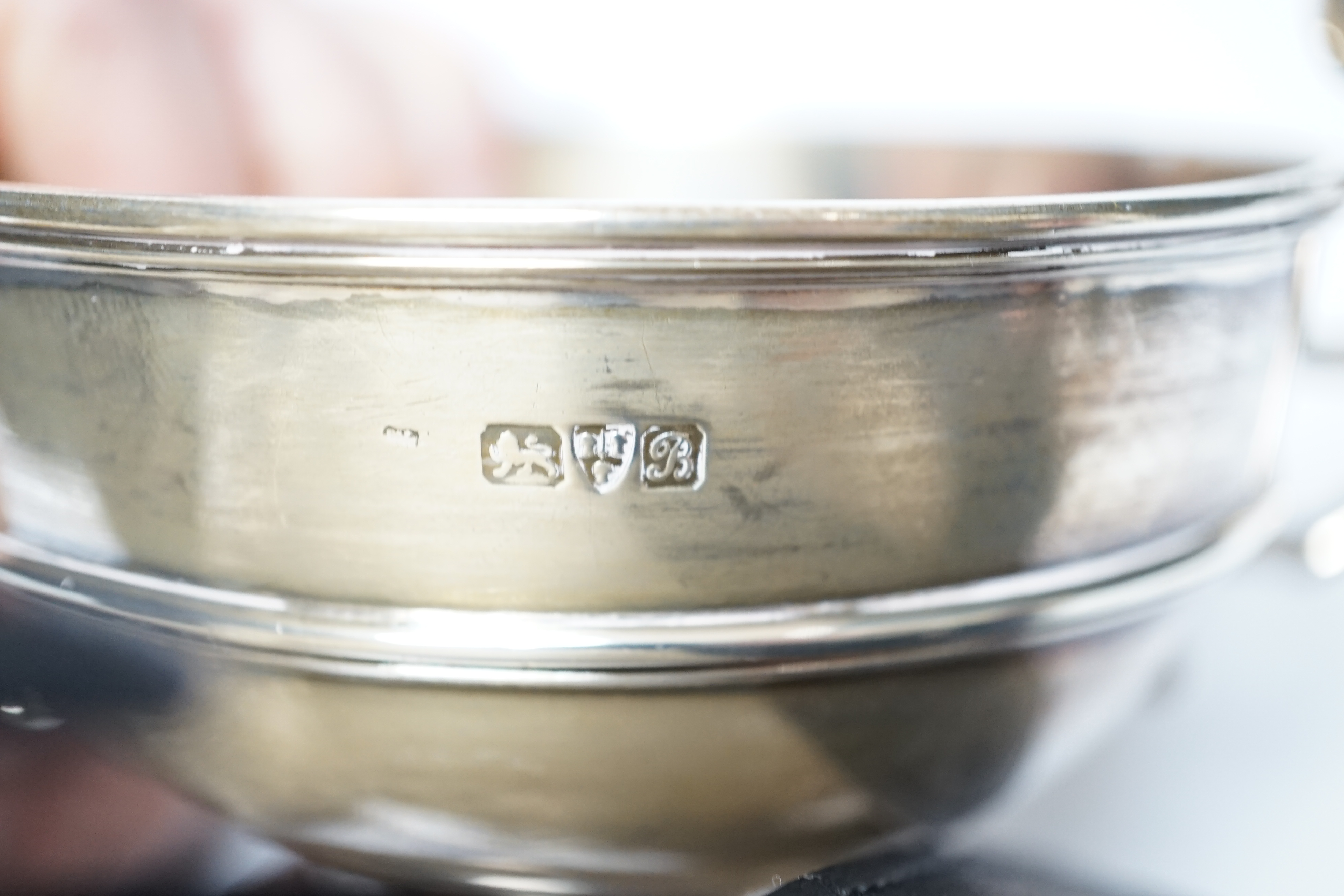An Edwardian silver two handled bowl, Chester, 1902, diameter 10.4cm, a sterling bowl, a pair of engraved silver tub salts and matching salt spoons, Mappin & Webb, Sheffield, 1908 and a set of five silver teaspoons.